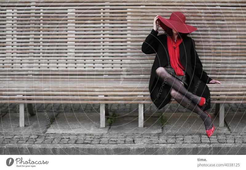 lady rocks the bench Woman Bench Hat Red Black heels Scarf urban Break Sit stylish Exceptional stop