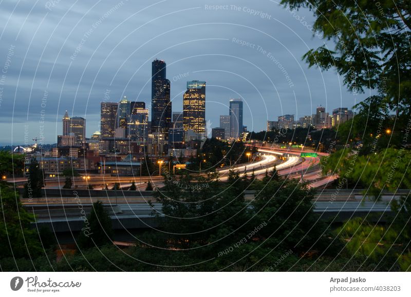Seattle Skyline Cityscape with Light Trails and Traffic Freeway I5