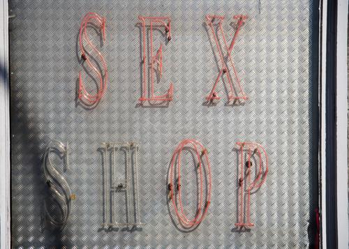 SEX SHOP daylight Neon sign Capital letter Typography Broken Red Illuminate Design Shop window Trade Signs and labeling Word English Metal plate Neon light neon