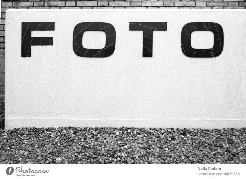 Photo (museum) Analog Analogue photo B/W Black & white photo writing Wall (barrier) Wall (building) Concrete Entrance photo museum Gray Exterior shot Deserted
