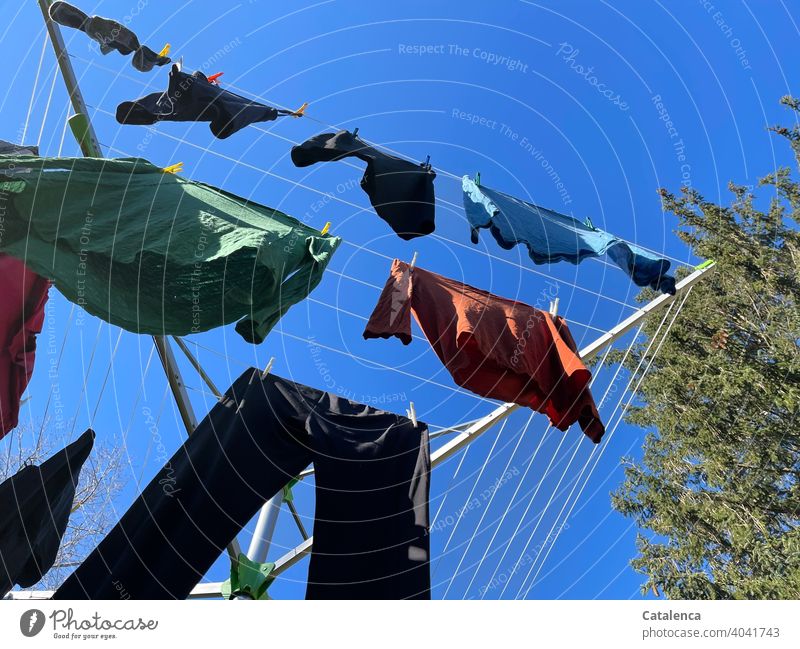 Laundry hangs to dry under blue sky Washing Washing day clothesline Dry Clean Hang up Photos of everyday life Clothing garments Fresh Household Cotheshorse