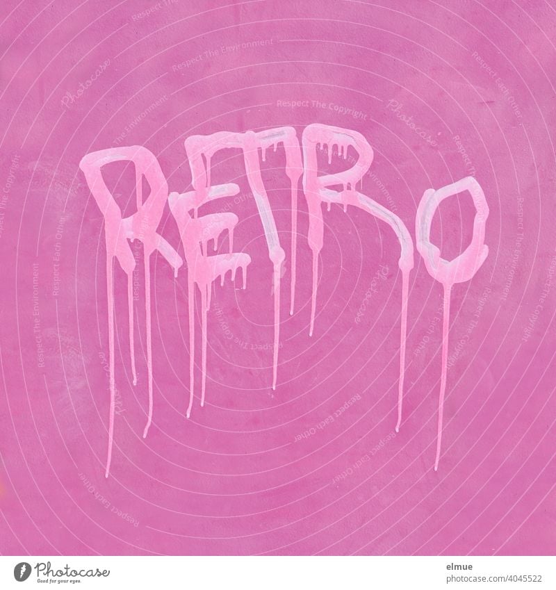 "RETRO" is written in bright pink, gradient block letters on a pink wall / graffito / paint Retro Colour Printed letters pass light pink Pink Flashy Graffito