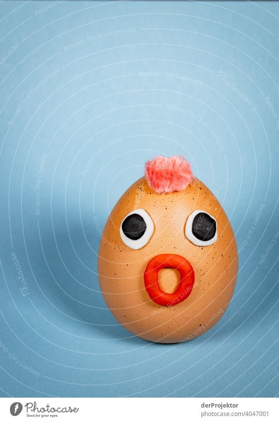 Amazing easter egg with punk hairstyle and eyes and mouth made of plasticine Easter Easter eggs Easter Monday Easter gift Easter wish Easter weather Egg