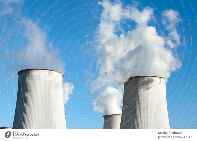 Smoking chimneys against the blue sky, environmental pollution concept. industry smoke power station plant dirty energy electricity global warming ecology coal