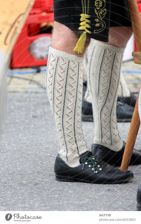 strapping man's legs in traditional costume Man Legs Sock group Stockings oatmeal shoes Tradition folk festival Clothing hairy legs Leather shorts Pattern