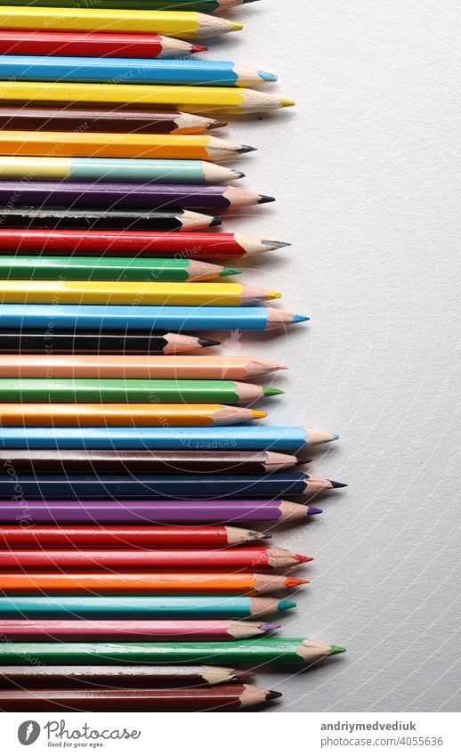 Color pencils set, row wooden color pencils isolated on white background. colored pencils for drawing. copy space up close sharp rainbow group green education