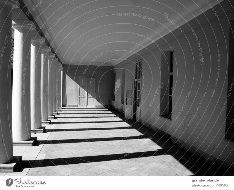 the aisle Light Diagonal Vanishing point Marianske Lazne Architecture Column Shadow Black & white photo Corridor