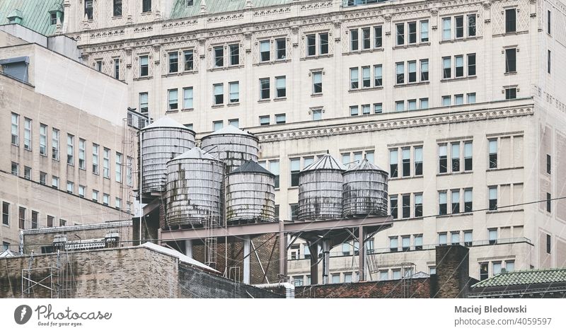 Old water towers, one of New York City symbols, USA. city building water tank architecture NYC Manhattan old cityscape picture view facade window urban