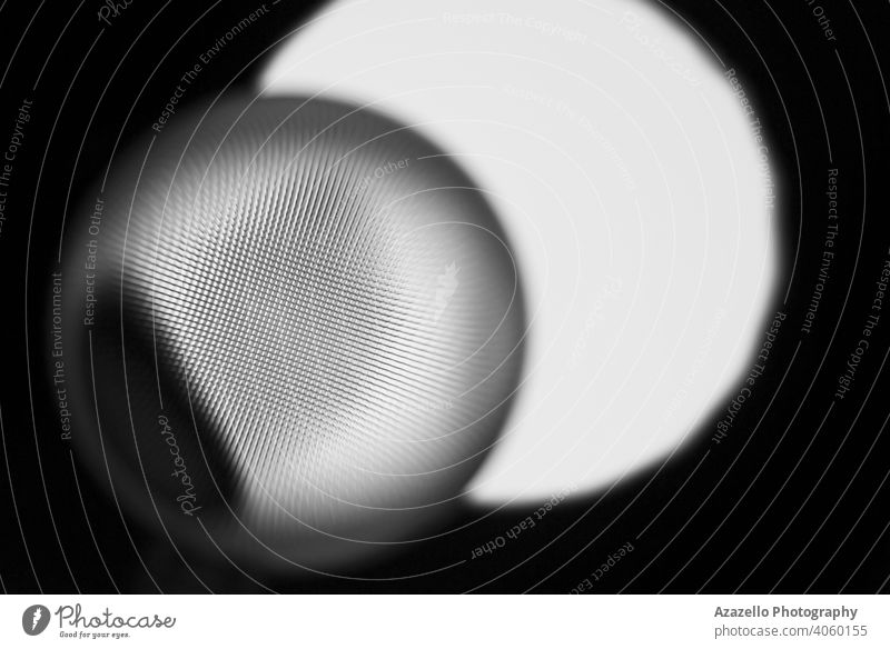 Abstract eye-shaped object in black and white. 3d abstract background beam black minimalism blue blur blurry blurry background blurry object chaos circle color