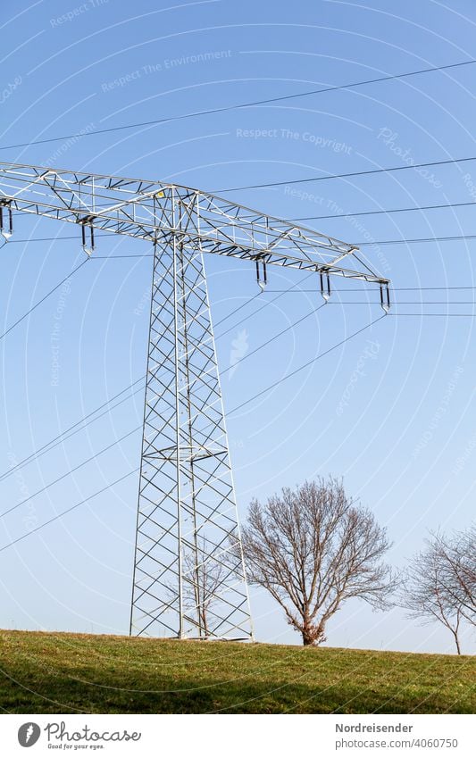 Newly erected high voltage pylon in a rural environment Energy stream Provision Electricity Transmission lines Tension Pole power supply Cable Transport