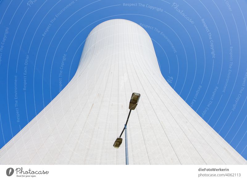 Cooling tower of a coal-fired power plant against a blue sky Architecture colors Bright travel technology Blue Gray White Refrigeration Hard coal unostentatious