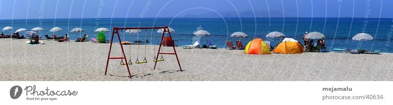 A summer day Ocean Beach Sunshade Swing Europe Beautiful weather