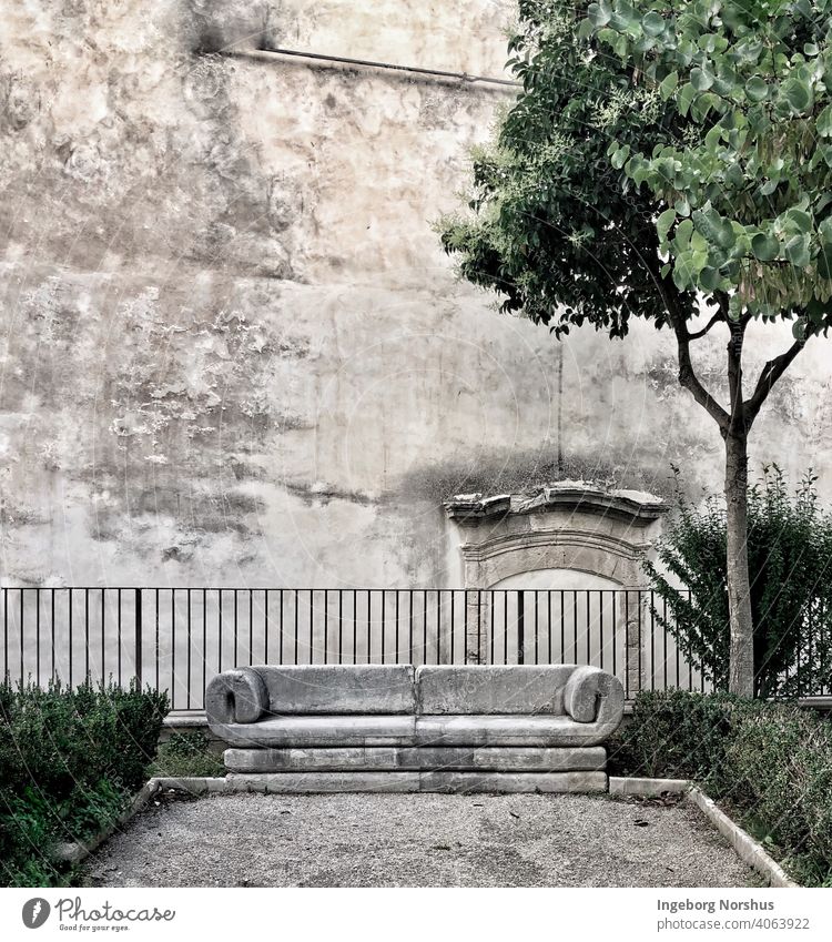 Marble bench in front of ancient wall Bench Deserted Exterior shot Day Colour photo Subdued colour Old Loneliness Copy Space top Empty Seating Calm Stone wall