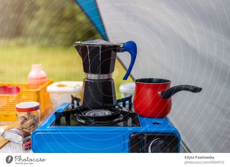 Coffee maker on a gas cooker outside a tent camping stove travel mokka adventure black breakfast cappuccino coffee coffee maker coffee pot cooking no people