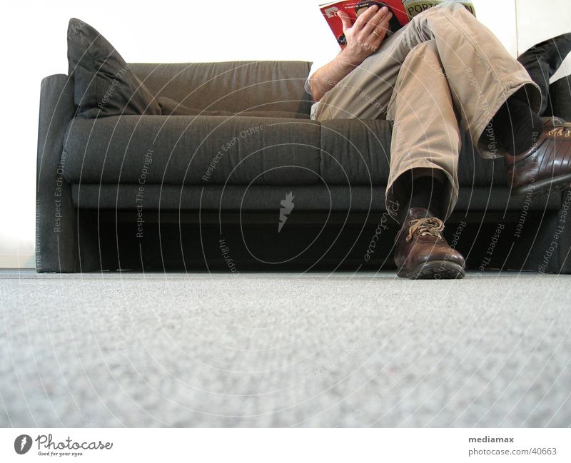 waiting Reading Relaxation Sofa Worm's-eye view Cushion Human being Wait Legs legs crossed Sit