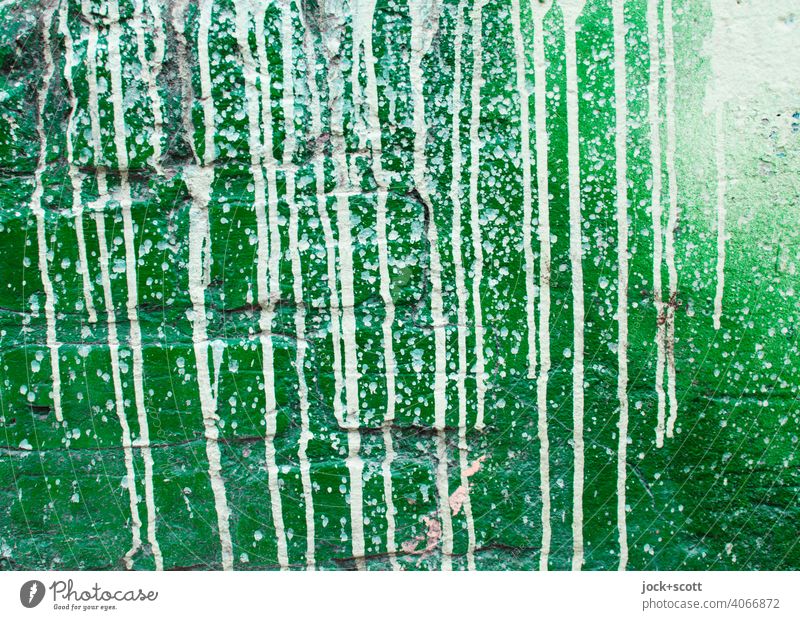 a wall designed with green and white Street art Subculture Graffiti Color gradient Green Expressive Dried Inject Detail Abstract Structures and shapes