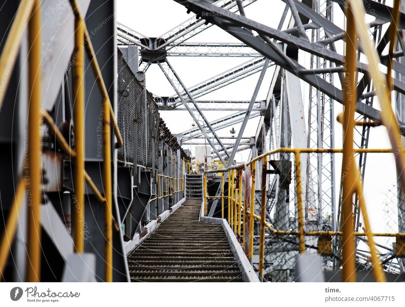 F60 Passageway colliery open pit mining Metal Scaffolding Iron reeds lines align Yellow Gray Corridor off Tall Depth of field Aspire Architecture Safety