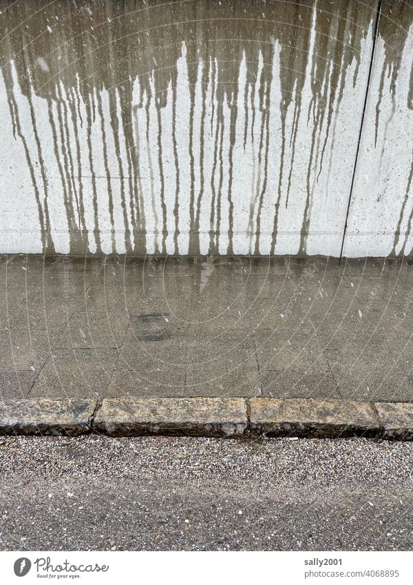 foul weather... Street Sidewalk off Concrete wall Rain Thaw wet water traces grey in grey Pattern Wet Gloomy Gray Bad weather Wall (building) Wall (barrier)
