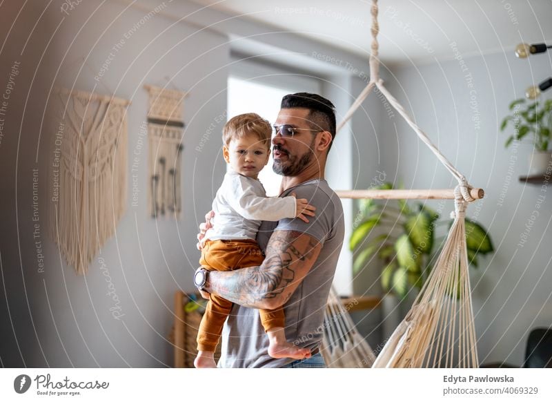 Father playing with his little son at home single parent single dad fathers day fatherhood stay at home dad paternity leave modern manhood family child house