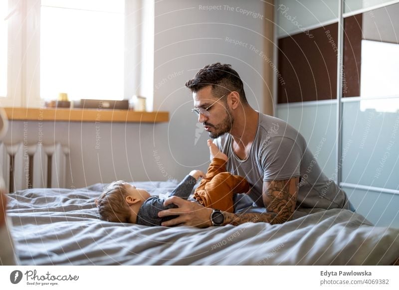 Father and baby son having fun together at home single parent single dad fathers day fatherhood stay at home dad paternity leave modern manhood family child