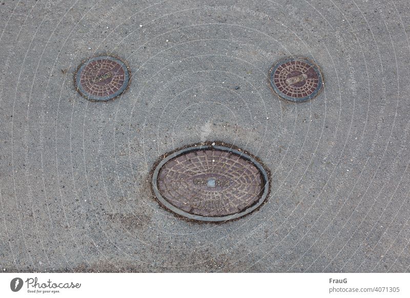 3 manhole cover on the road Traffic infrastructure Street Asphalt Manhole cover Covers (Construction) Metal Cast iron pebbles Face Gray