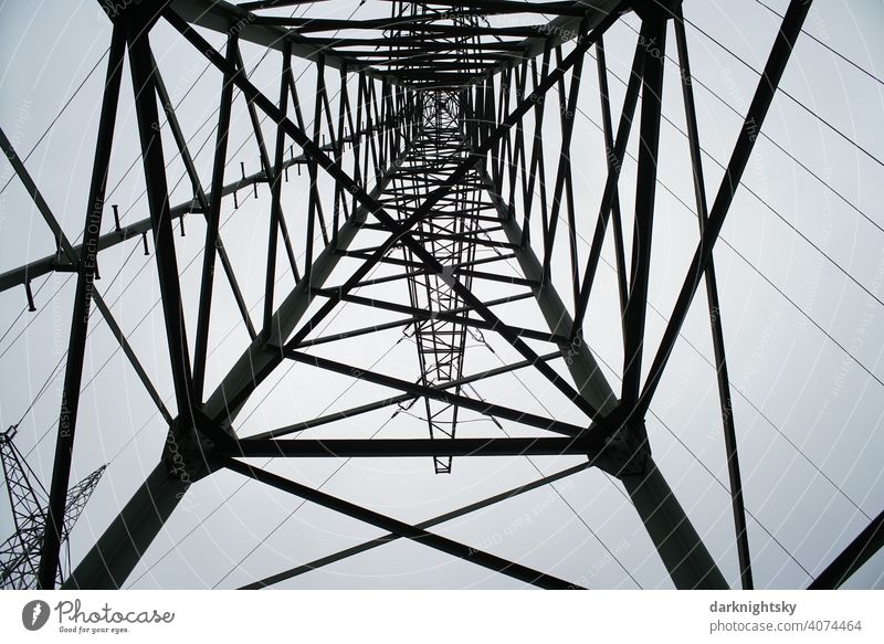Transport of electrical energy by cables on a mast in the form of a static truss construction Cable Clouds Colour photo Transmission lines Technology