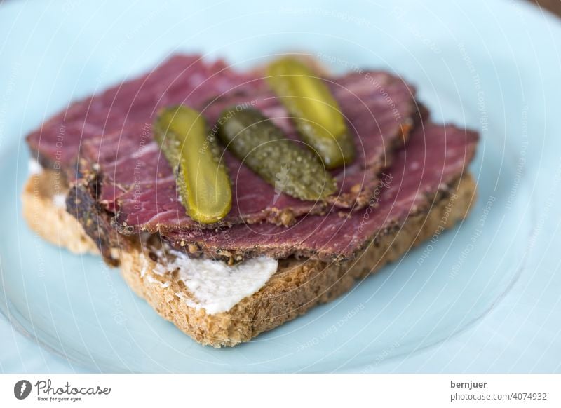 Pastrami on rye toast Close-up Mustard Bread Delicious Culinary Jewish Pepper homemade pastami Table Horizontal deli red meat Beef Contentment rye bread