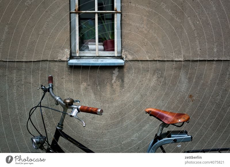 Bicycle in the backyard Old building on the outside Fire wall Facade Window House (Residential Structure) rear building Backyard Courtyard Interior courtyard