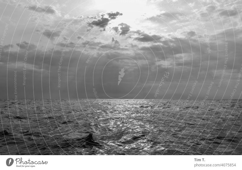 sailing on the baltic sea with cloudy sky but the sun comes through Sailing Sky Sunlight bnw Water Ocean Exterior shot Summer Deserted Vacation & Travel Freedom