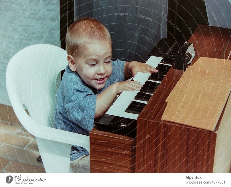 First Names | Wolfgang Amadeus... Toddler Organ Musician Musical instrument Interior shot Piano Practice Make music fun Happiness Playing Concert Play piano