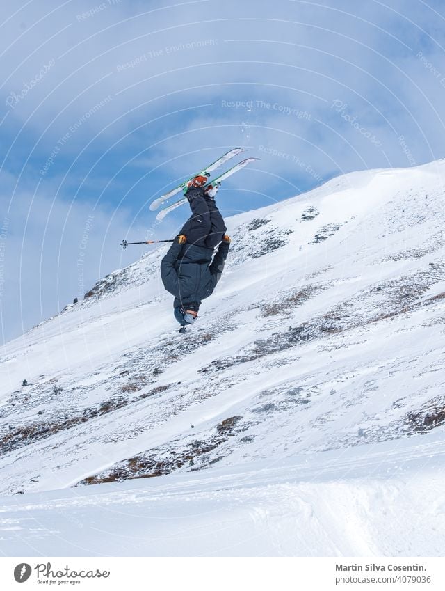 Young  man skiing on a sunny day in Andorra. action active alps andorra arcalis athlete background cold colour competition deep snow downhill editorial extreme