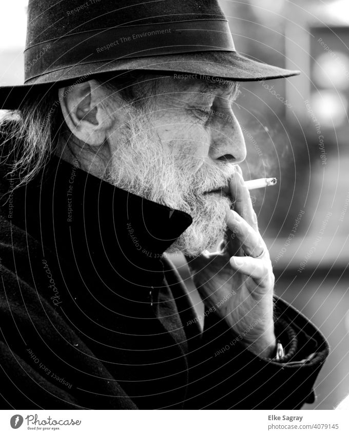 Elderly Gentleman Thoughtfully Smoking... Man Only one man Exterior shot Surface of water Black & white photo smartphone Shallow depth of field Senior citizen