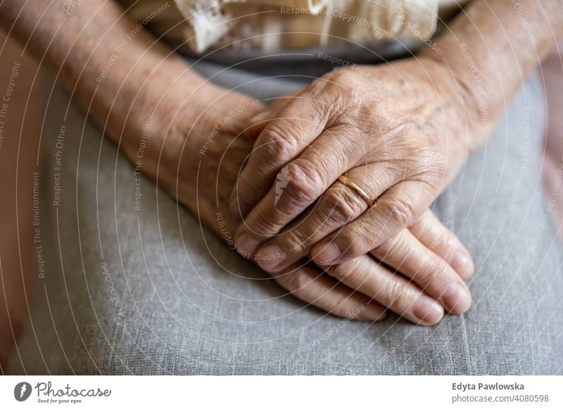 Wrinkled hands of a senior woman people mature casual female Caucasian elderly home house old aging domestic life grandmother pensioner grandparent retired