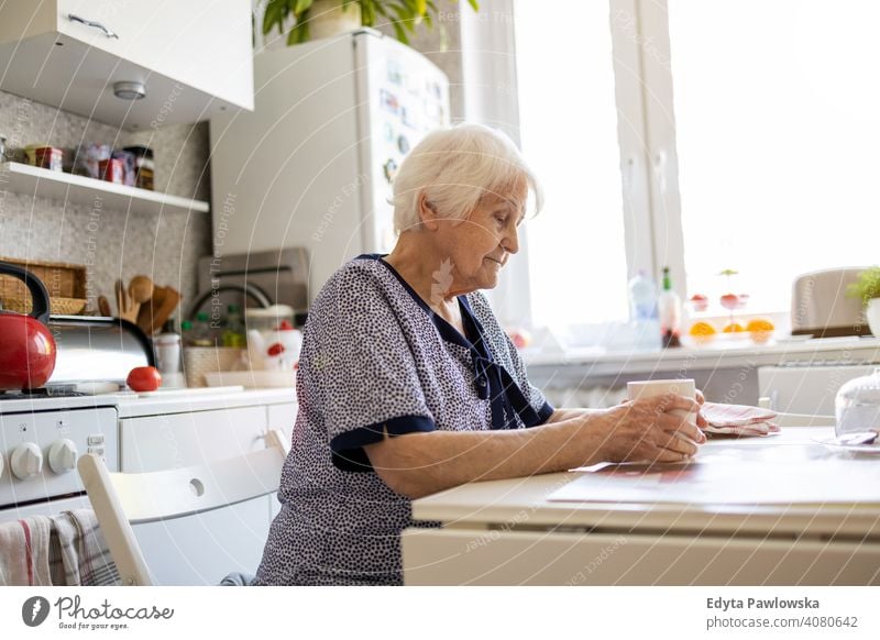 Portrait of an elderly woman  at home sad lonely unhappy depression uncertainty anxiety worried grief sadness loss problem crisis serious nostalgia thinking