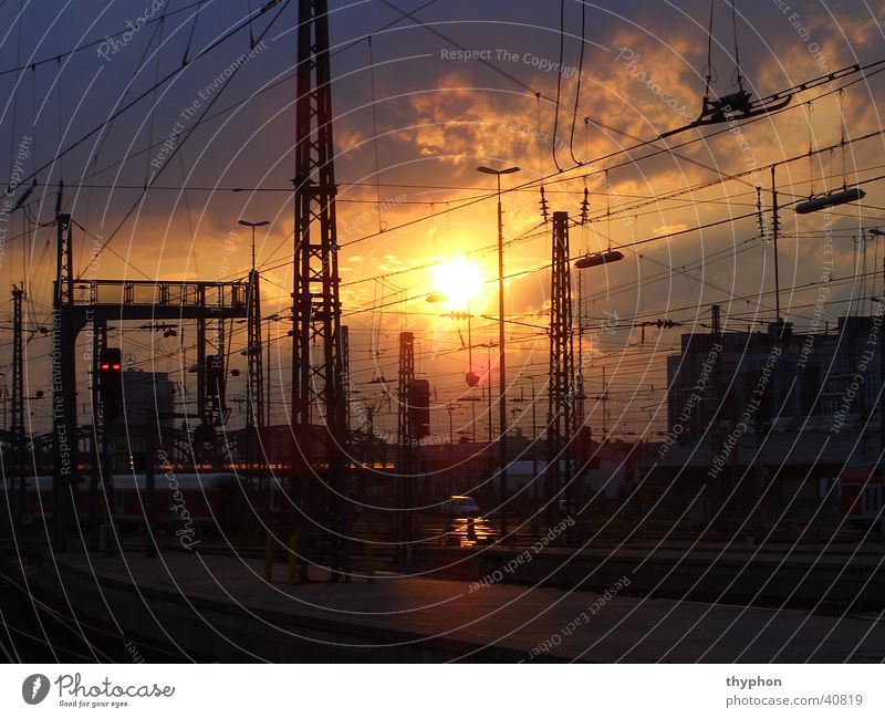 Sunset at the station Overhead line Wire Railroad tracks Munich Transport Train station Scaffold