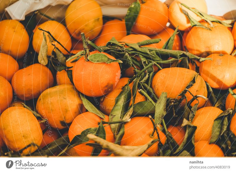 Valencia, Spain, delicious seasonal clementines tangerine fruit sweet food raw harvest healthy vitamin citrus citric many abundance orange green leave organic