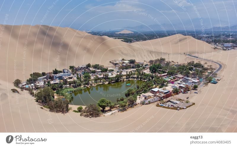 View of the Huacachina oasis in Ica, Peru abstract awe calmness desert destination dream dune ecosystem explore extreme famous famous place huacachina ica