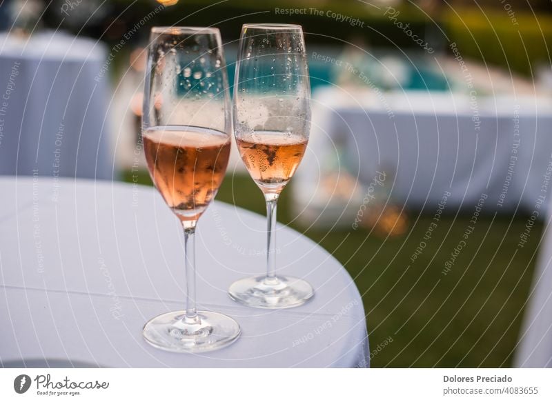 Two half glasses of rose wine drink alcohol winery luxury party liquor romantic beverage cabernet wineglass refreshing celebrate pour celebration merlot