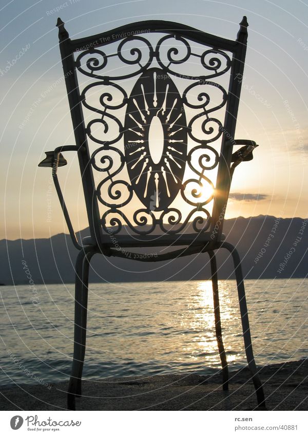Chair in the morning light Sunrise Ocean Back-light Romance Leisure and hobbies Contrast