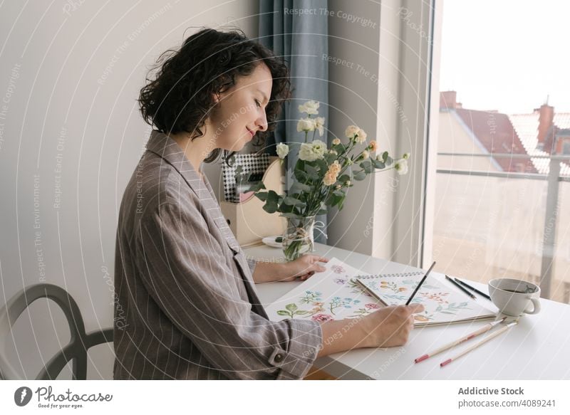 Woman painter working at home woman drawing picture flower hand art artist workplace creativity design craft leisure artwork professional inspiration talent