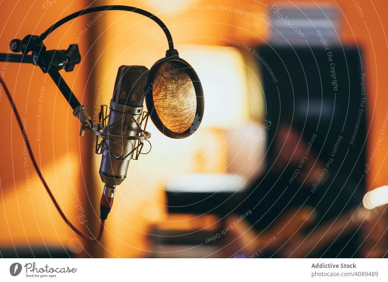 Professional studio microphone recording silver pop isolated sound jockey industry communication radio singing karaoke professional cable using shield