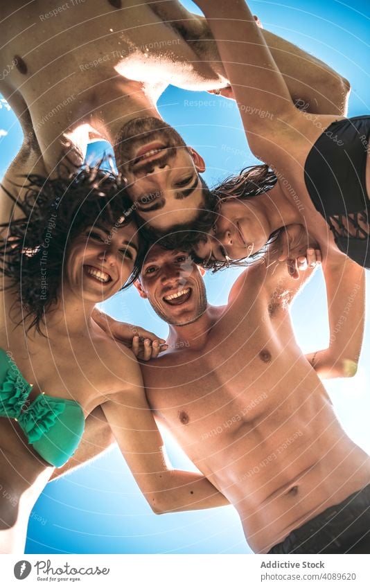 Friends hugging posing for photo friends summer vacation fun leisure happiness bikini laughing together party cheerful friendship holidays sun joyful resort