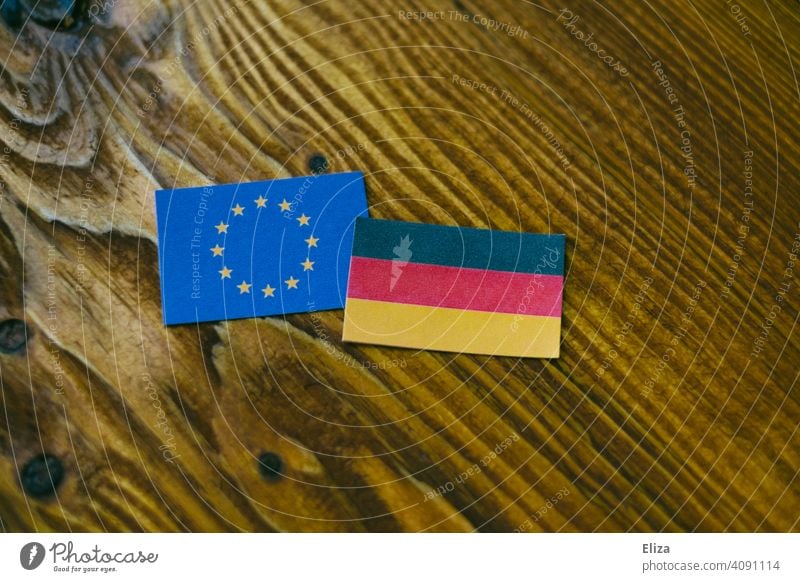 European and German flag on wood Germany EU European Union Flags European flag Politics and state Ensign Wood flags German Flag