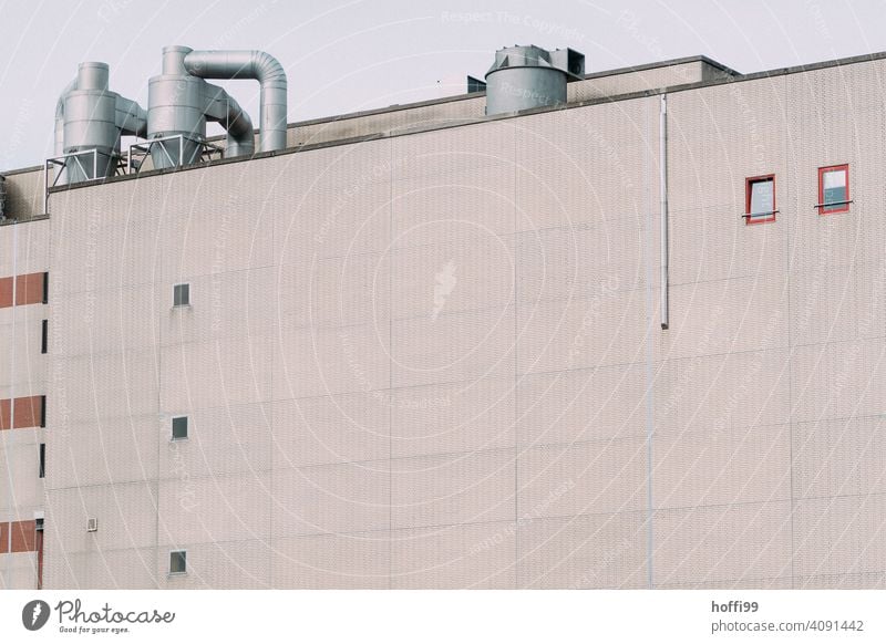 drab exterior facade of an industrial plant Warehouse Harbour Storage Facade Depot Wall (building) Industrial plant Factory Architecture Trade