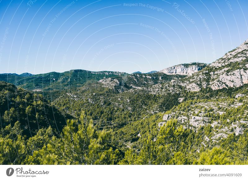 view from the top of a mountain in catalonia. eroded layered canyon nature outdoors travel destinations spain tarragona descent moment moody ascend haze huge