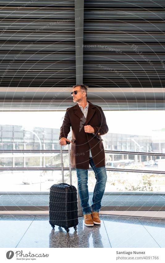 Caucasian business man at airport person lifestyle people middle aged handsome senior caucasian city adult male portrait casual urban confident fashion