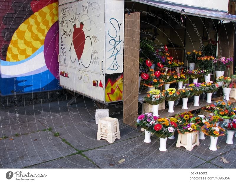 shabby sales trailer with fresh flower bouquets flowers Flower stall Stall assortment Selection Authentic open Graffiti Street art Daub wall design Dirty