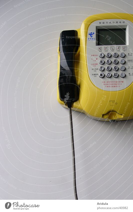 phone_01 Information Deutsche Telekom Telephone Phone book Extract Telephone information line Discussion leader Connect Telephone cable China Yellow Motionless