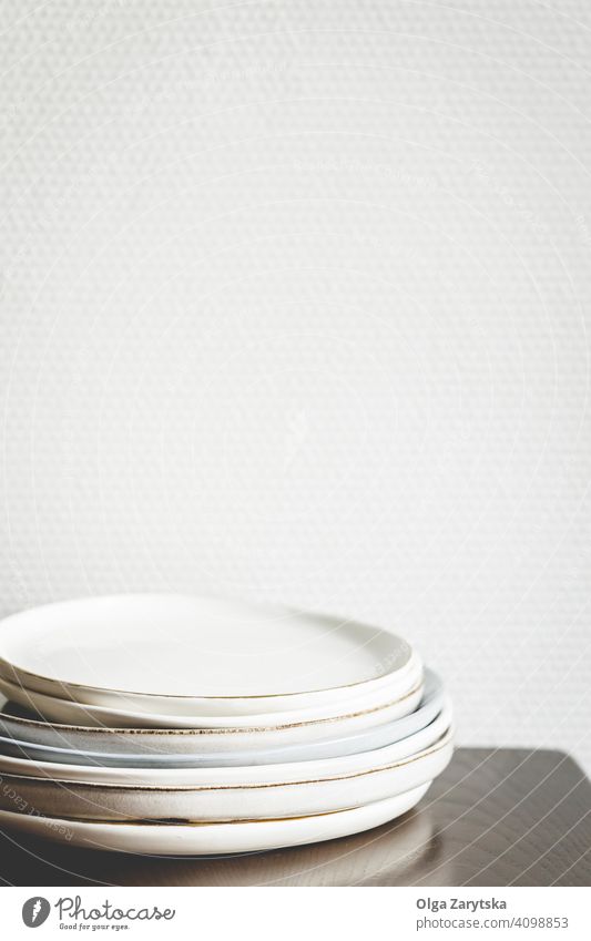 Stack of ceramic plates. dish table stack white wall many minimal crockery tableware
