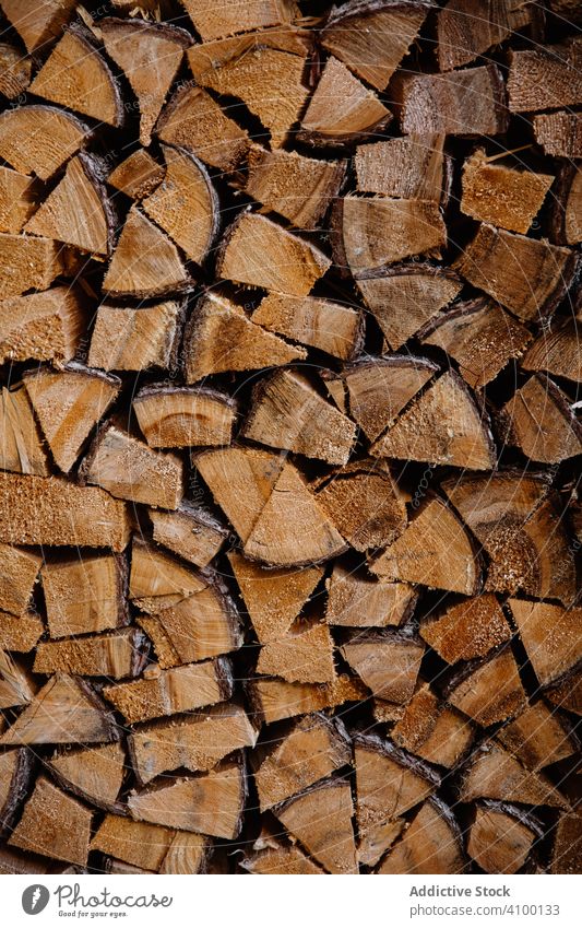 Large supply of dry firewood stock stacked fuel tree material natural old pile storage texture flora timber heating mining plant winter industry countryside